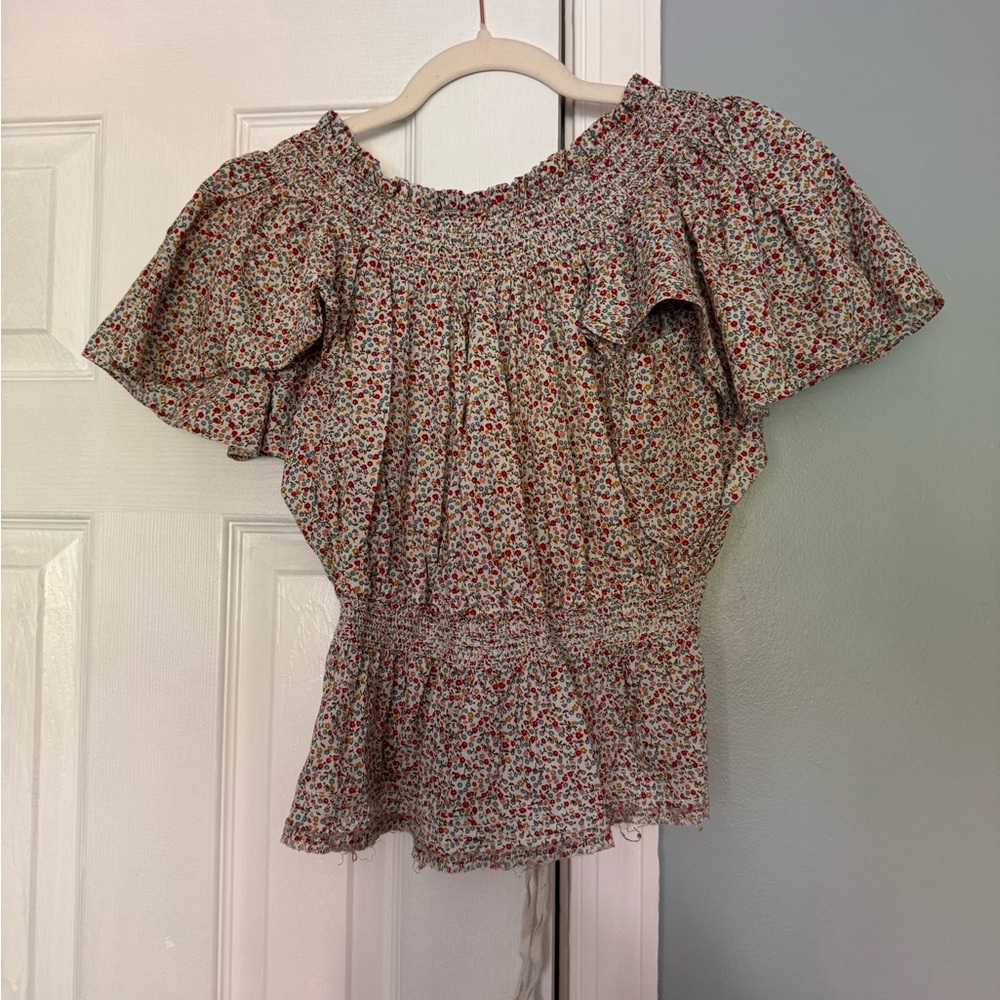 THE GREAT. Cream ditsy floral cotton blouse smocked neckline flutter sleeve